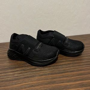Kids black new balance shoes